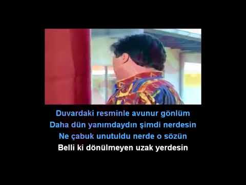 CENGİZ KURTOĞLU - DUVARDAKİ RESMİNLE