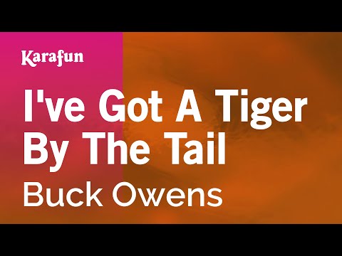 Buck Owens - I've Got A Tiger By The Tail